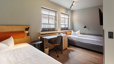 Modern eingerichtete und funktionale Zimmer im Hotel am Jakobsmarkt